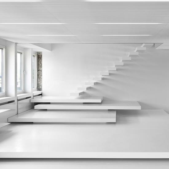 Design Kragarmtreppe aus Corian von Treppenbau JOHN