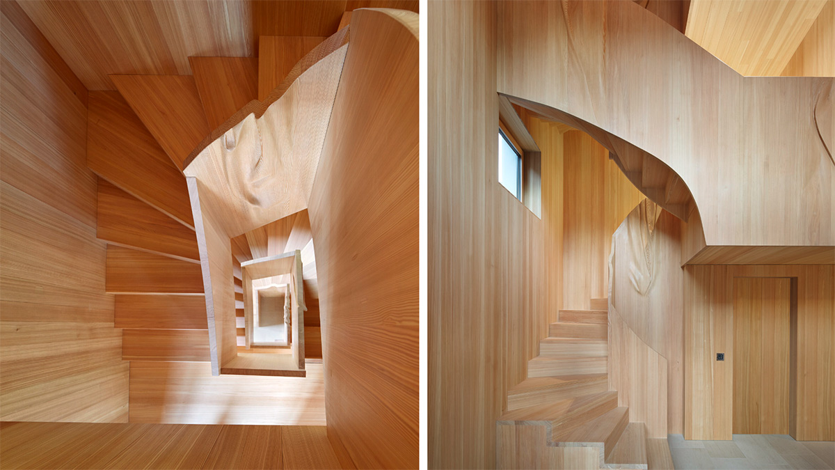 Exklusive Massivholztreppe aus Lärchenholz mit brüstungshohem Geländer von AMBAUEN Treppen